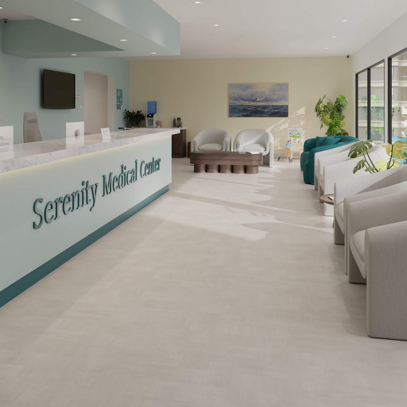 Reception area of a medical center with Waterblock X Kasu light grey stone-look floor, a reception desk and seating area.