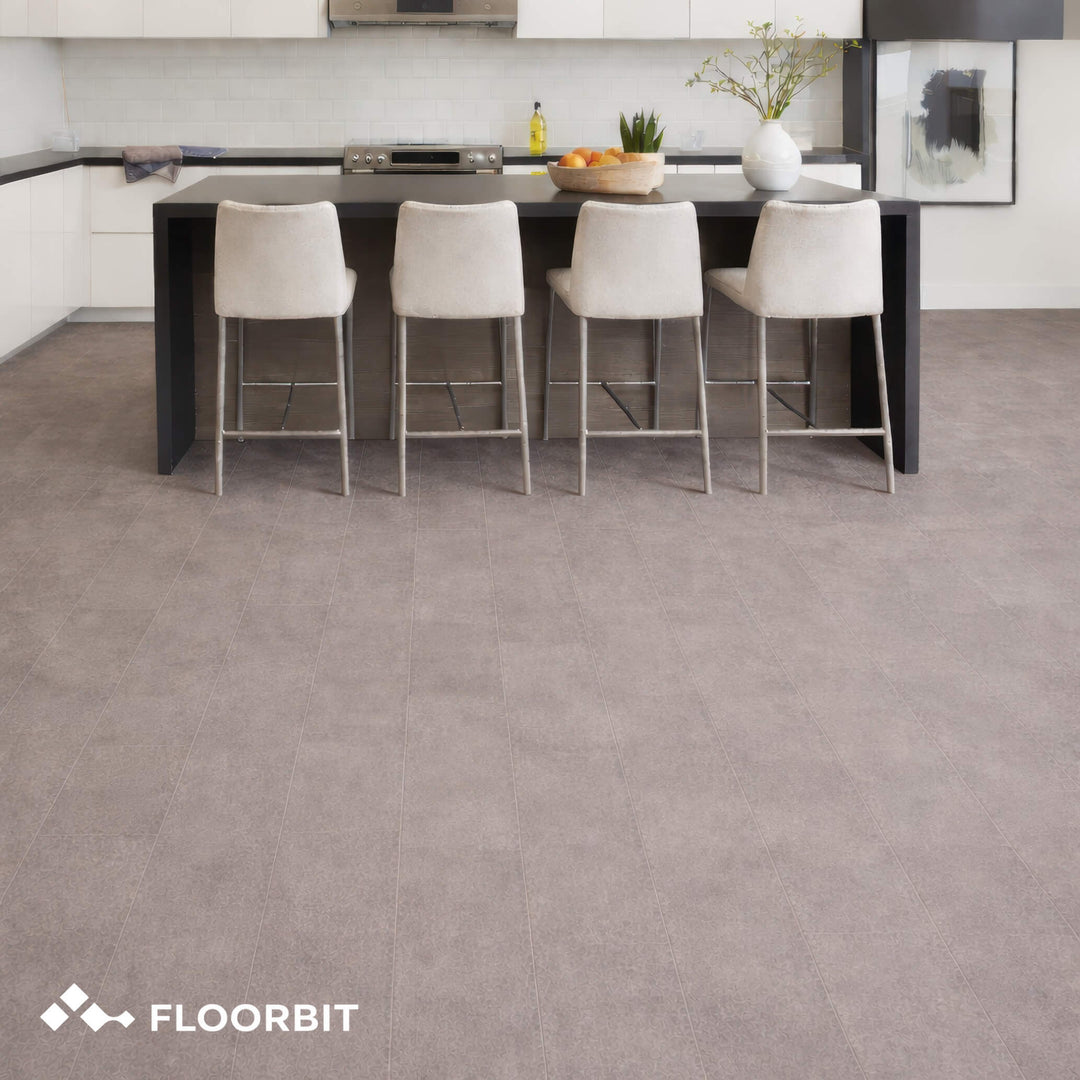 Modern kitchen with a Waterblock X Horu light taupe stone-look floor and bar stools, featuring the brand 'Floorbit'.