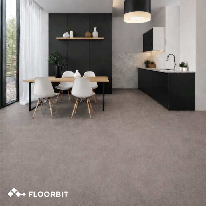 Modern kitchen and dining area with Waterblock X Horu light taupe stone-look floor, featuring the Floorbit brand.
