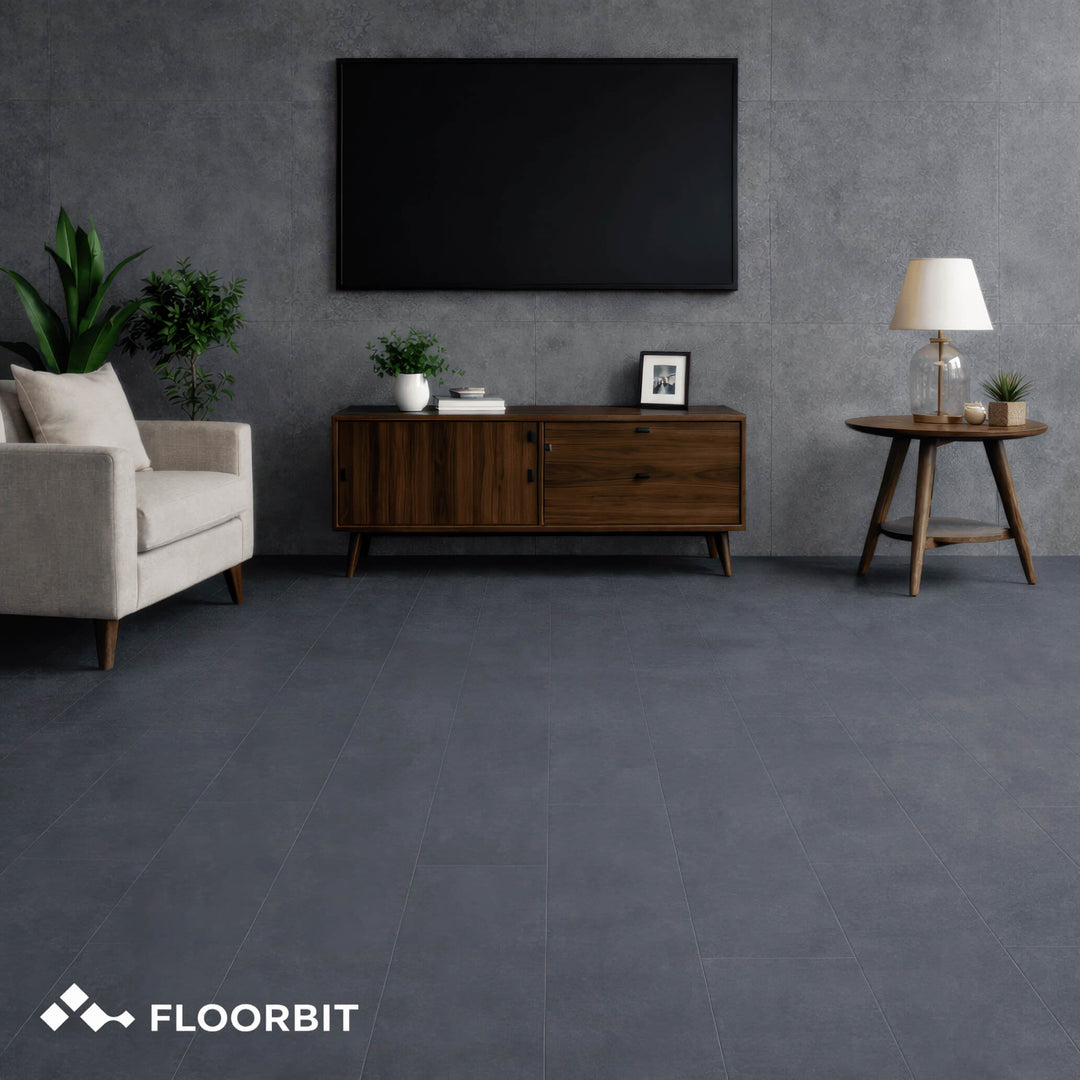 Modern living room with Waterblock X Joku dark grey stone-look floor, furniture, and a television.