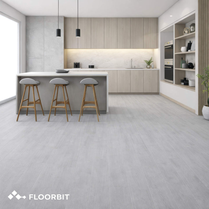 Modern kitchen with Waterblock X Kasu light grey stone-look floor, white countertops, and wooden cabinets.