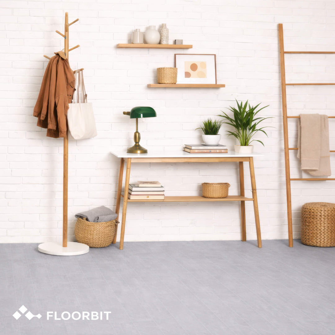 Modern interior with wooden furniture, plants, and decor items on Waterblock X Kasu light grey stone-look floor.
