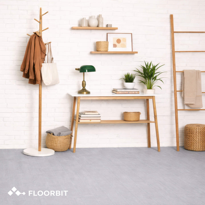Modern interior with wooden furniture, plants, and decor items on Waterblock X Kasu light grey stone-look floor.